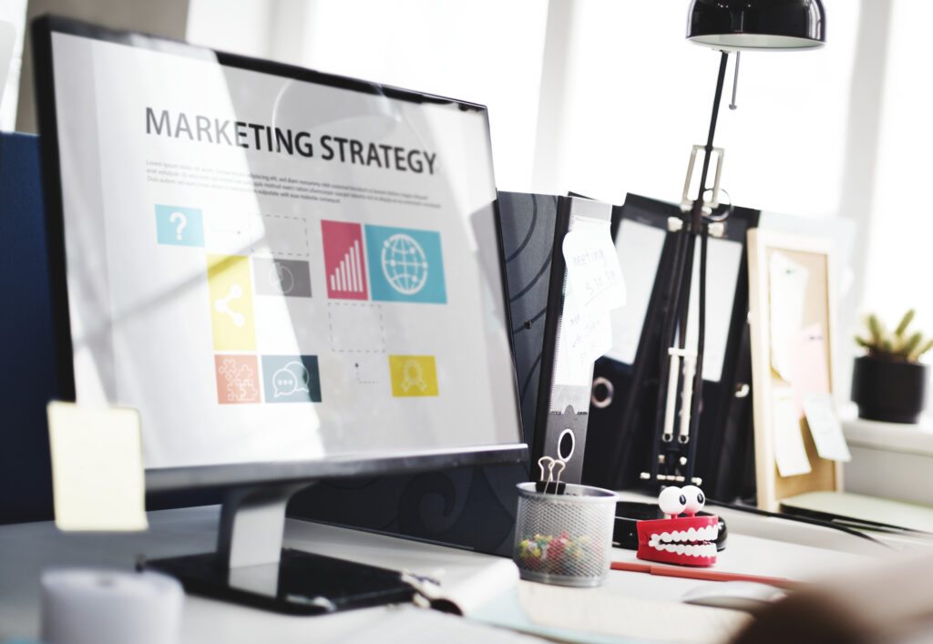 Photo a desktop, with a digital marketing strategy, presented on it, on a table in an office
Related tags
